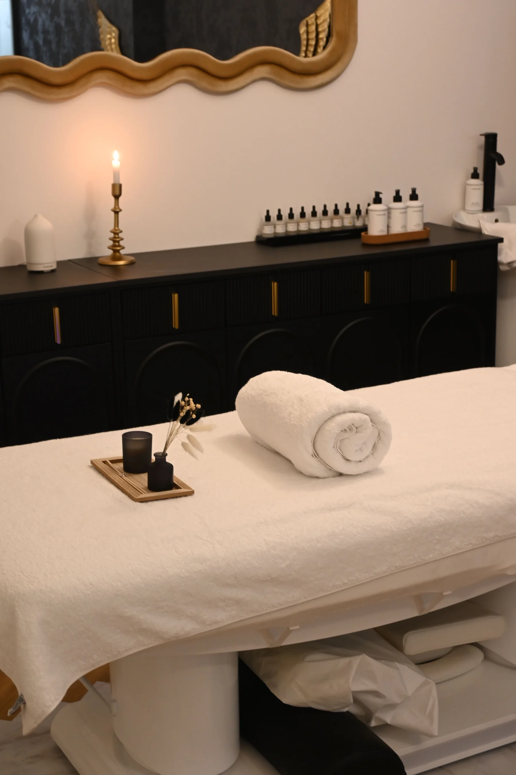 Calm massage room prepared for a professional spa visit